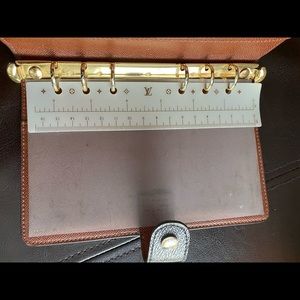 Louis Vuitton Planner. Card holders inside.